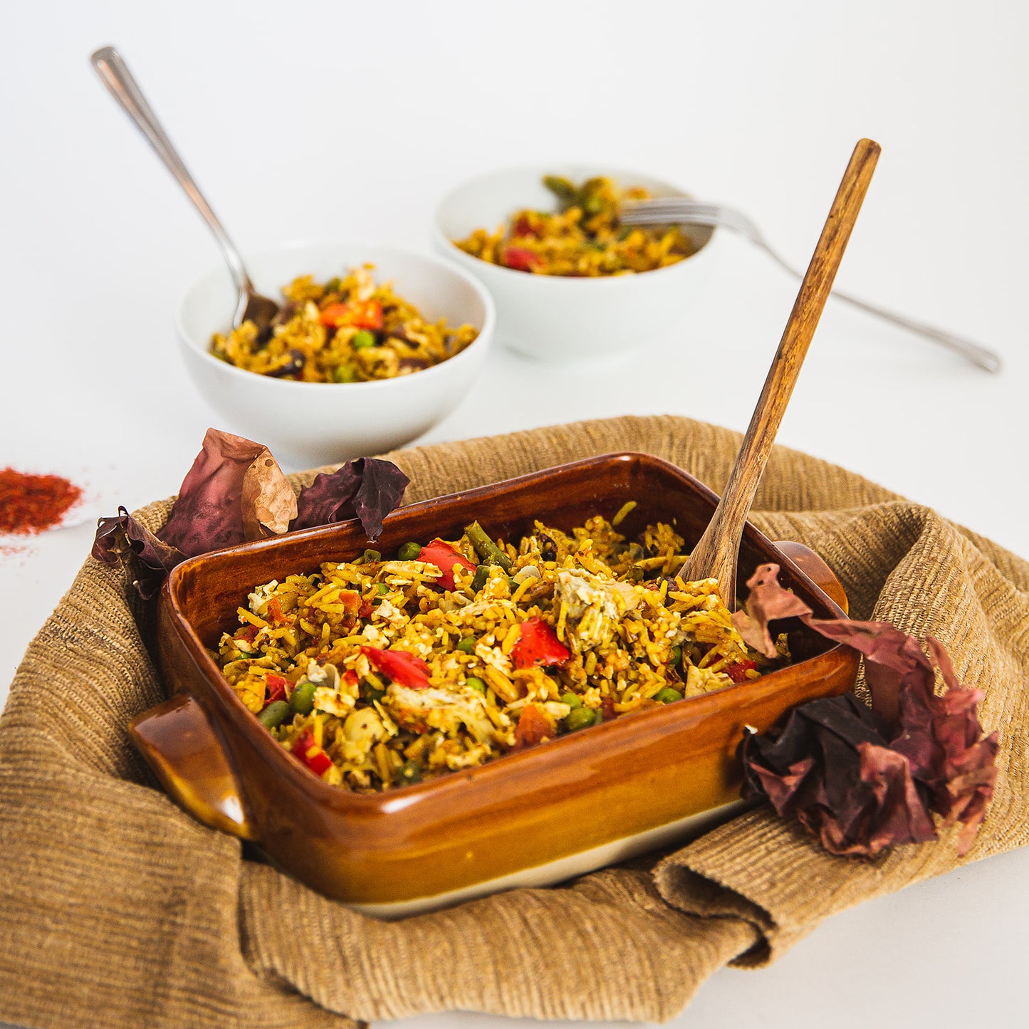 Paella with artichokes and seaweed