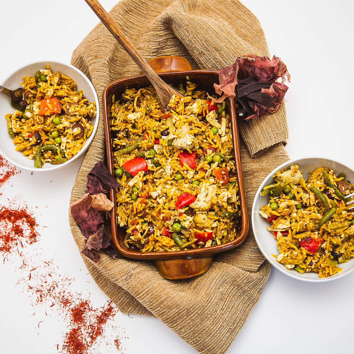 Paella with artichokes and seaweed