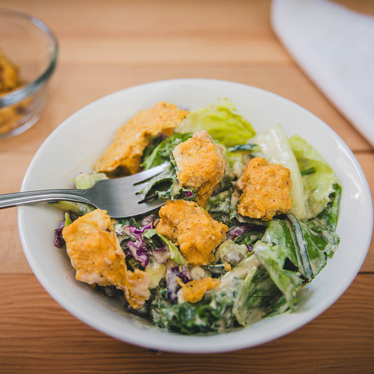 Caesar salad and popcorn tofu